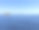 浅蓝色的天空，深蓝色的大海和蓝白色的船图片下载