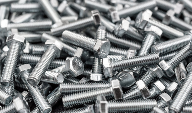 金属螺栓作为抽象的工业背景。图片下载