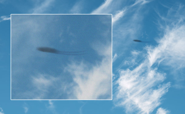 宇宙飞船，天空中的不明飞行物，户外摄像机屏幕上的外星人，科幻幻想或阴谋论。外星飞船模糊的证据，超现实的飞碟在云中飞行和摄像机记录图片下载