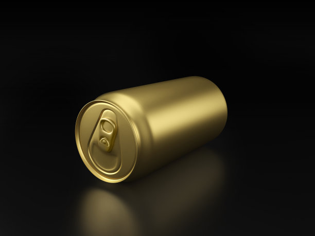 黑色背景上的金色铝罐图片下载