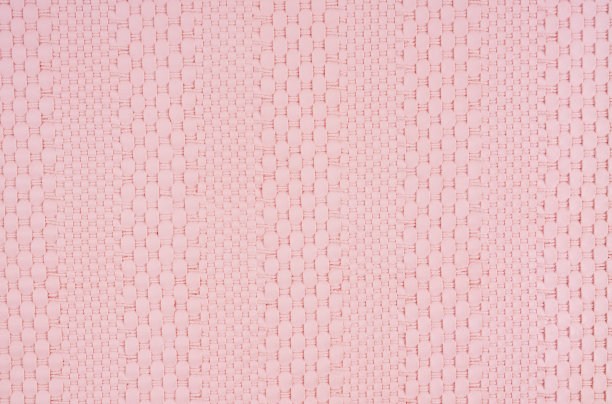 粉红色编织皮革纹理图案。图片下载