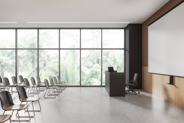 现代礼堂内部有一排椅子和模拟投影屏幕图片下载