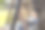 年轻男人坐在吊床上看书照片图片下载