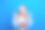 照片肖像漂亮的金发女郎兴奋的手指点起穿着企鹅毛衣圣诞帽孤立的蓝色背景图片下载