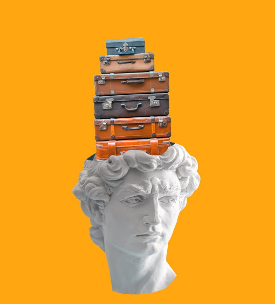 黄色背景上的白色石膏头像和手提箱。图片下载