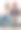 十几岁的男孩和女孩坐在阁楼式明亮房间里的沙发上，女孩打开一个男孩送的红盒子。生日礼物，情人节礼物，圣诞节礼物。青少年的人际关系。水平的照片。图片下载