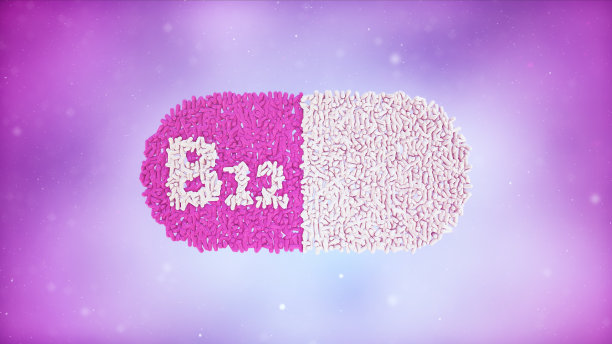B12维生素胶囊上的渐变颜色背景股票照片图片下载
