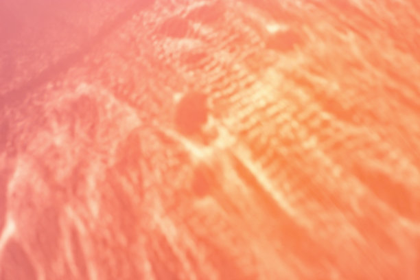 散焦抽象橙紫色背景与白色耀斑从阳光，节日背景，庆祝壁纸。绚丽夺目的阳光，闪闪发光的唯美质感照片，潮流色彩图片下载