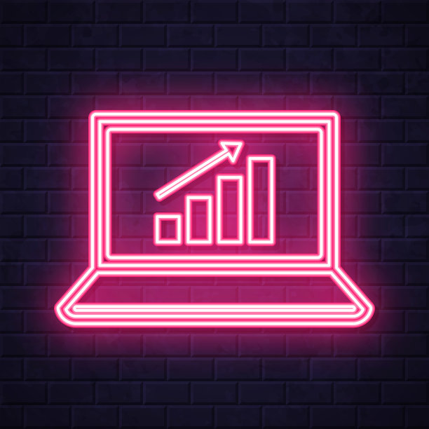 笔记本电脑上的成长图表。在砖墙背景上发光的霓虹灯图标图片下载