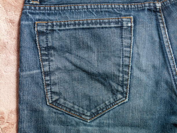 特写牛仔裤细节照片在工作室。没有人。图片下载