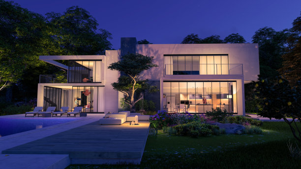 美丽时尚的现代房子，晚上有游泳池和花园图片下载