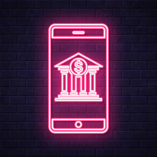 带银行的智能手机。在砖墙背景上发光的霓虹灯图标图片下载