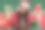 躺着的年轻女孩黑发与男友聊天的照片选择家庭堆礼盒数字销售孤立的绿色背景图片下载