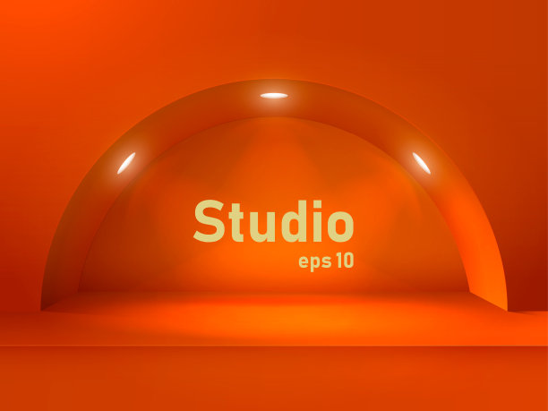 空荡荡的橙色工作室，有灯光。广告和展示产品的空间和背景。图片下载