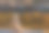 一个男人背靠着长凳坐着的木制雕像。图片下载