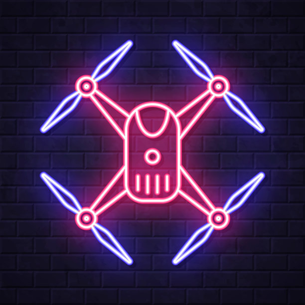 无人机-四轴飞行器。在砖墙背景上发光的霓虹灯图标图片下载