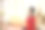 一个漂亮的年轻女子在花店穿着红毛衣Cosplay的肖像图片下载
