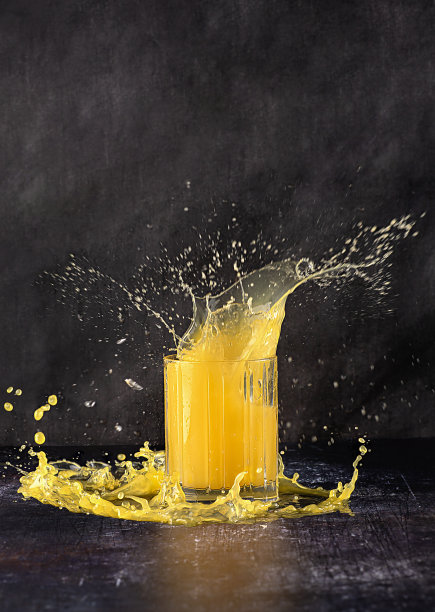 橙汁飞溅的照片图片下载