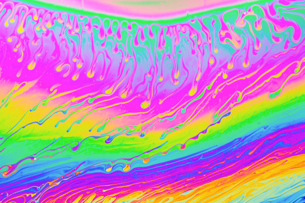 迷幻多色背景抽象。彩虹的颜色。模式的背景。肥皂泡的微距照片图片下载