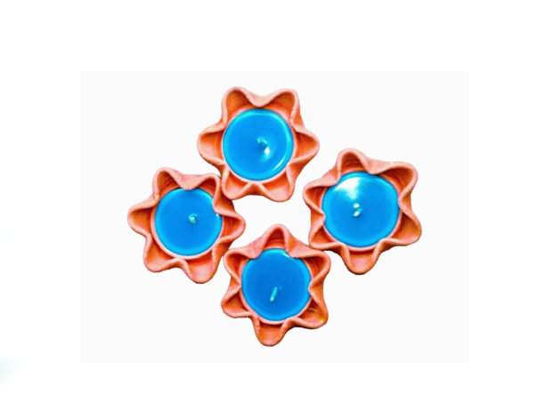 陶罐里的蓝色蜡烛图片下载