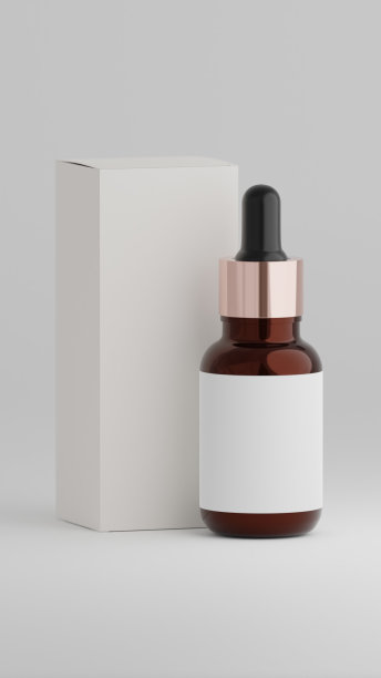 琥珀滴管瓶与包装盒隔离在一个普通的白色背景图片下载