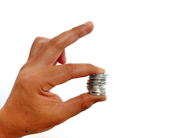 照片的主题是手握硬币的姿势图片下载