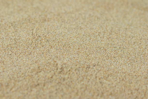 彩砂。沙滩为背景图片下载