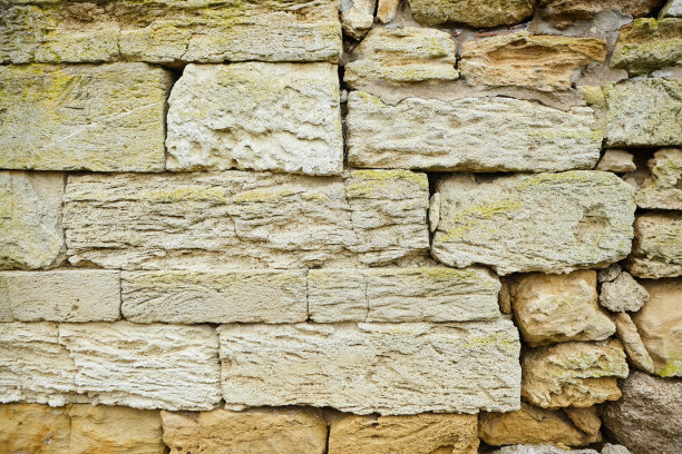 石墙照片的背景纹理。天然石材墙面纹理为背景。旧砖纹理图片下载