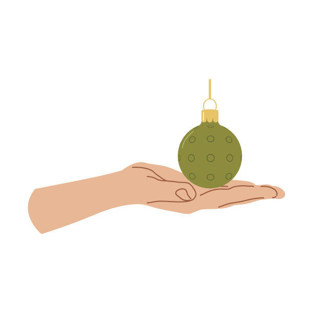 节日家装手拿圣诞球。图片下载