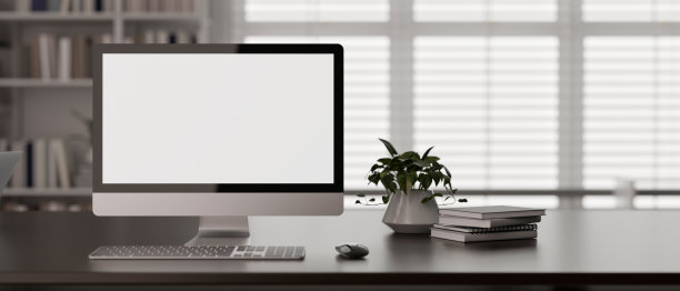 一个现代办公空间的正面视图，桌子上有一台PC台式电脑模型图片下载