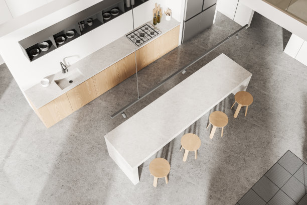 厨房内部的俯视图，设有酒吧岛和厨柜，冰箱图片下载