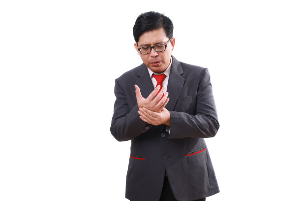 疲惫的亚洲商人手掌有问题。神经痛概念。孤立于白色图片下载