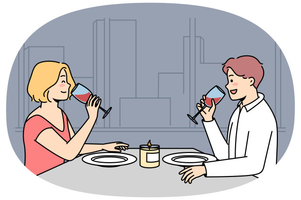 男人，女人坐在餐桌旁，在餐厅里喝红酒。图片下载