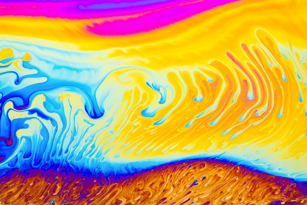 迷幻多色背景抽象。彩虹的颜色。模式的背景。肥皂泡的微距照片图片下载