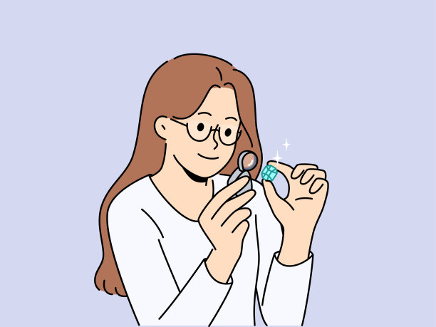 女珠宝商通过放大镜检查宝石，检查钻石的真伪图片下载