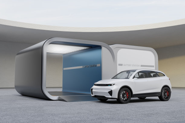 白色电动SUV停在电池交换站前图片下载