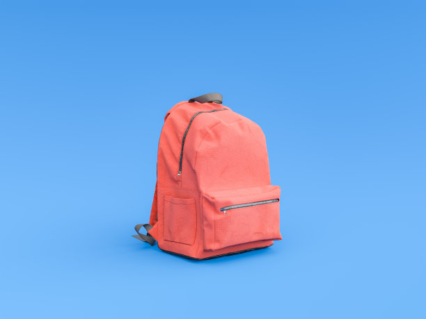 蓝色背景的红色背包，最小的教育概念图片下载