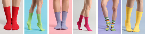 在不同颜色的背景下穿着不同颜色袜子的女人，特写。照片收藏图片下载
