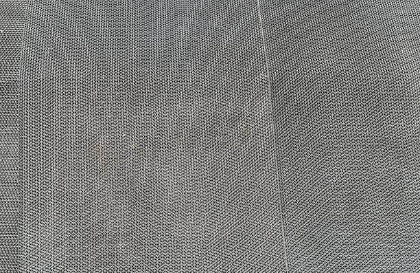 一张照片，一个男人穿着西装，打着领带站着。图片下载