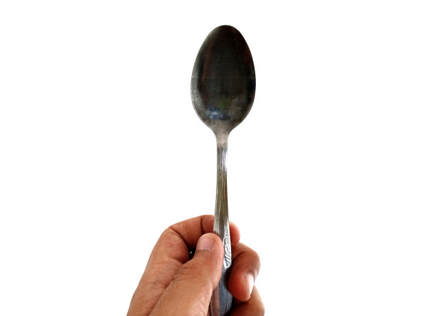 照片的概念是一只手拿着勺子图片下载