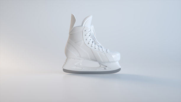 白色滑冰软灰色工作室背景。体育的概念。图片下载