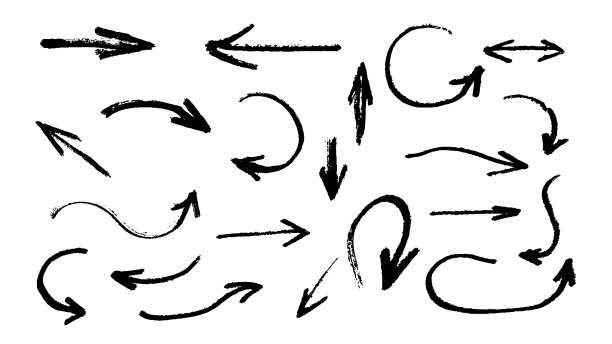 在背景上用黑色记号笔绘制的一组箭头图片下载