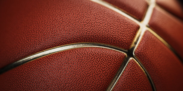 橙色篮球轮胎纹理的特写。图片下载