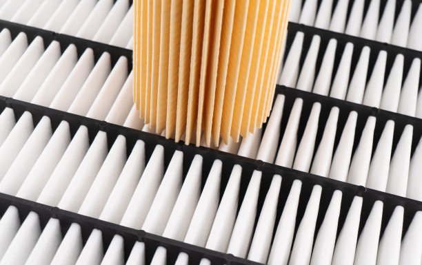 机油滤清器，空气滤清器纹理背景。汽车的备用零件优质的汽车维修备件。汽车配件图片下载