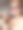 特写照片，迷人的红发女子坐在露天餐厅，拿着一杯加冰块的冰咖啡饮料，用吸管啜饮，在户外戴着太阳镜和背心裙，露天用餐的背景，重点在前景图片下载