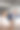 一组不同的合作伙伴坐在桌子旁，成熟的拉丁商人和欧洲商人在办公室用笔记本电脑讨论项目。两个同事的专业商务人士工作，垂直图片下载