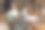 青年设计师工作项目。照片中的女人在现代阁楼里与新启动的项目一起工作。木桌上的通用设计笔记本图片下载