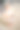 微笑的小女孩坐在一堆儿童童话书上，手里拿着智能手机图片下载