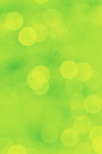 黄绿色散景灯作为春天的粉彩背景，抽象的散景背景，自然耀斑的灯光，模糊的圆形纹理作为节日背景，庆祝照片与光学效果图片下载