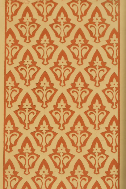 黄色背景上的橘黄色花朵图案图片下载